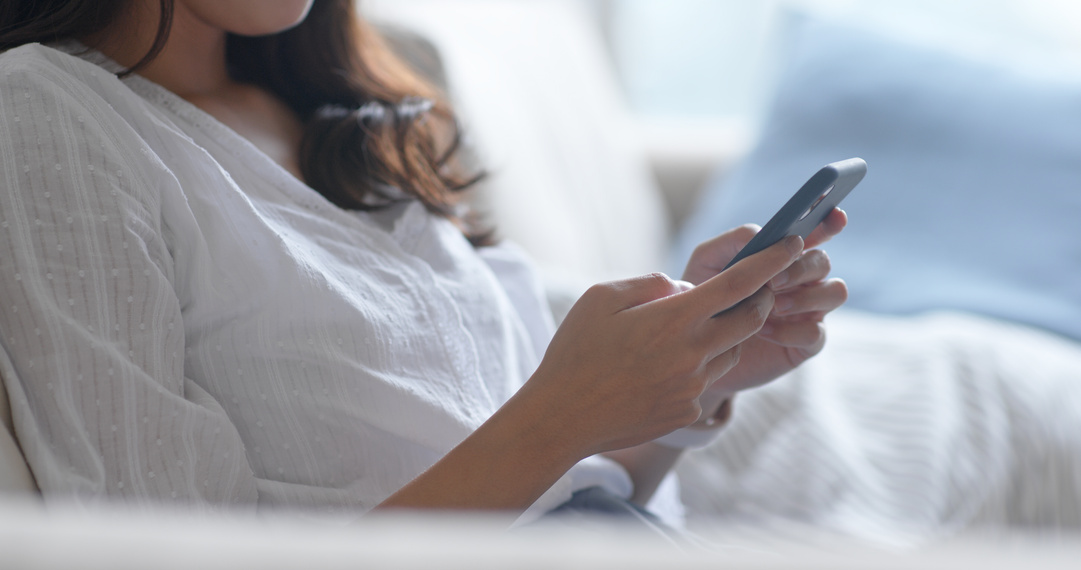 Woman Using Mobile Phone